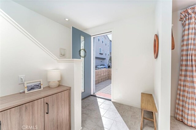 interior space featuring light tile patterned flooring