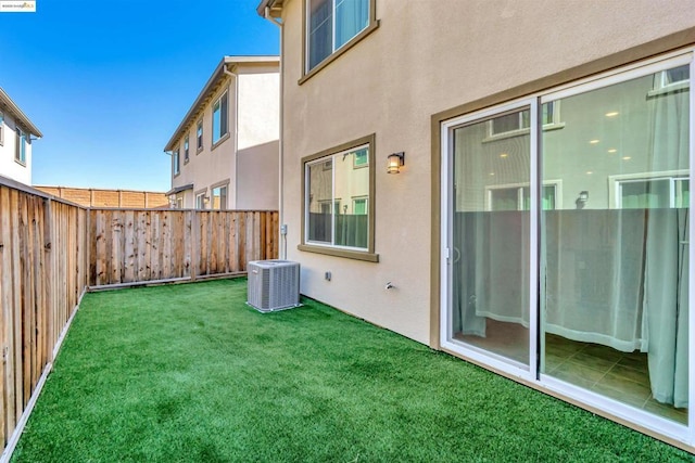 view of yard featuring central AC