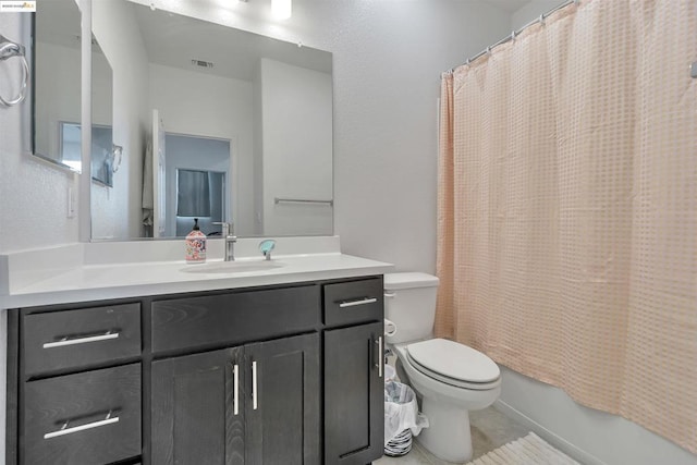 full bathroom featuring toilet, vanity, and shower / tub combo