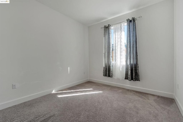 view of carpeted spare room