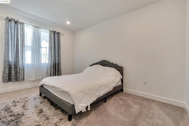 bedroom featuring carpet