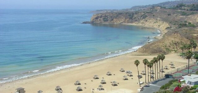 property view of water with a beach view