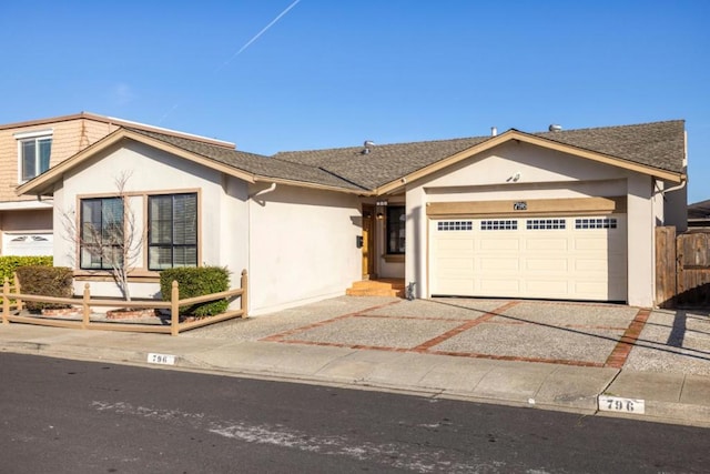 ranch-style home with a garage