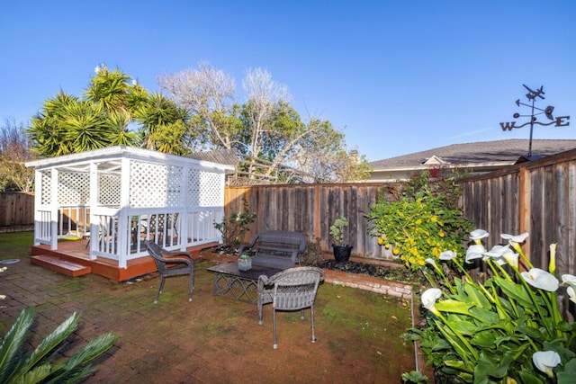 view of yard featuring a wooden deck