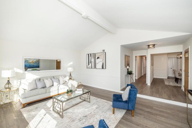 living room with vaulted ceiling with beams and wood-type flooring