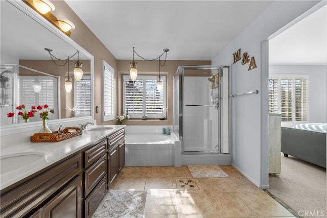 bathroom featuring vanity, separate shower and tub, and tile patterned flooring