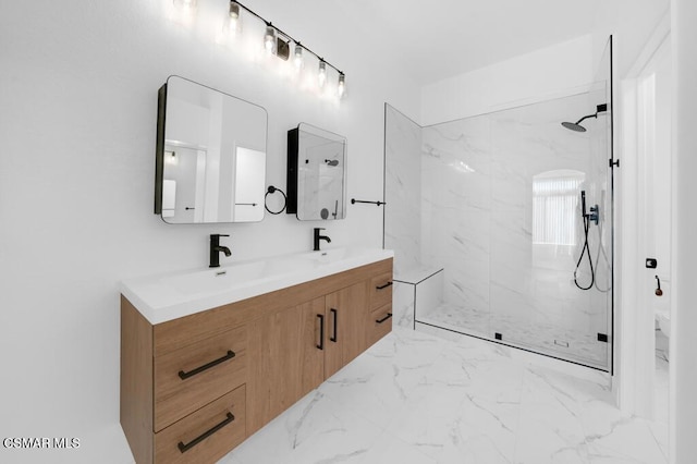 bathroom with vanity and a tile shower