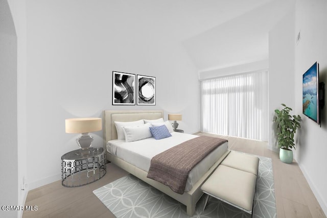 bedroom featuring light wood-type flooring