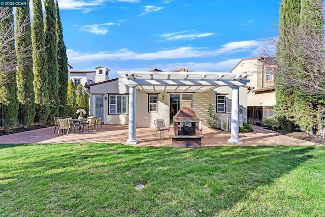 rear view of property featuring a pergola, a multi sided fireplace, a lawn, and a patio