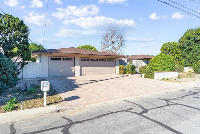 single story home with a garage