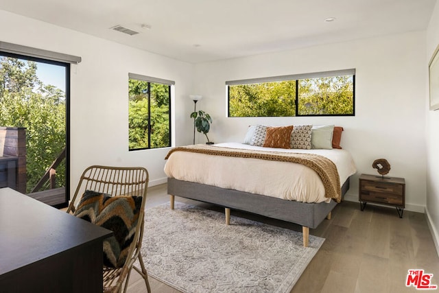 bedroom featuring light hardwood / wood-style floors