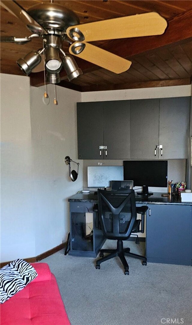 office space with ceiling fan and carpet