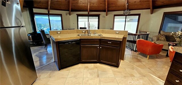 kitchen featuring decorative light fixtures, wooden ceiling, stainless steel refrigerator, and dishwasher