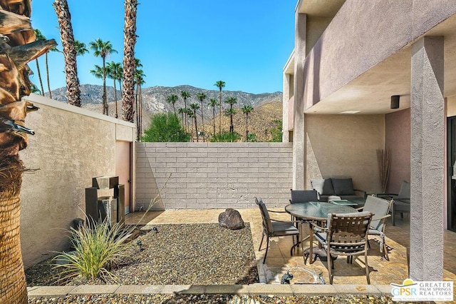 view of patio featuring a mountain view