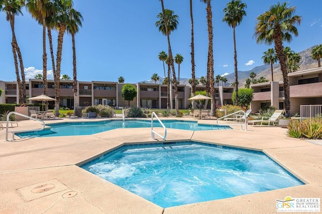 view of swimming pool featuring a patio