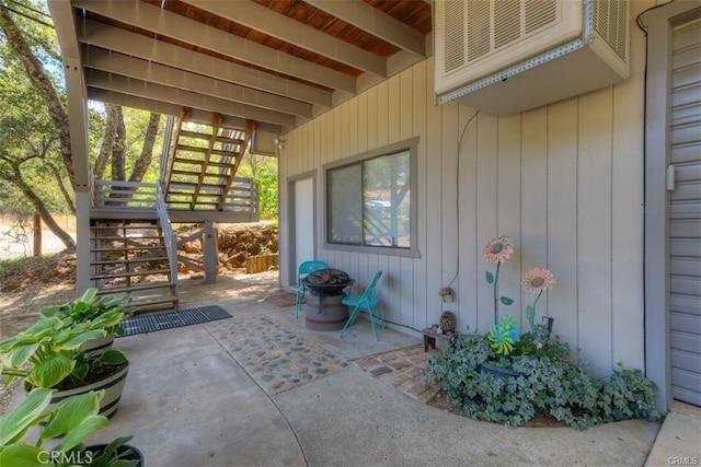 view of patio / terrace with a fire pit