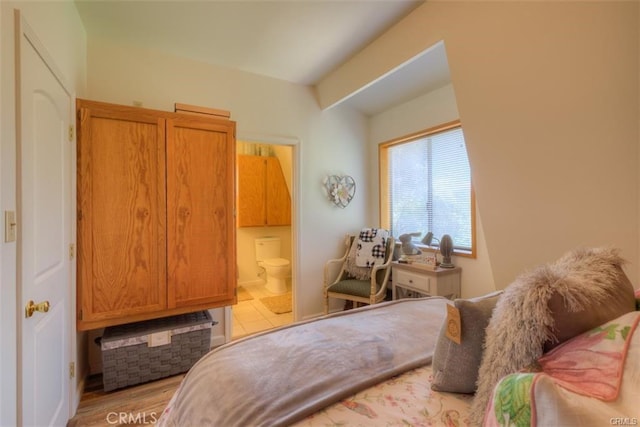 bedroom with ensuite bath