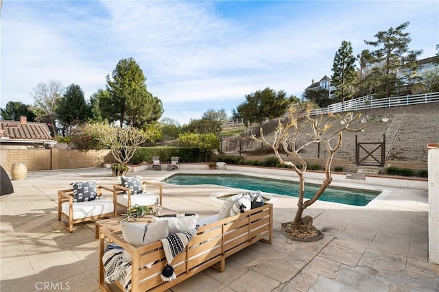 view of pool featuring an outdoor hangout area and a patio area