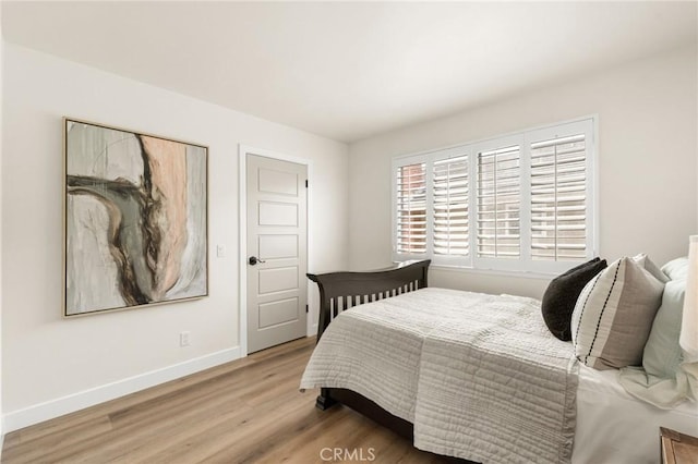 bedroom featuring hardwood / wood-style floors