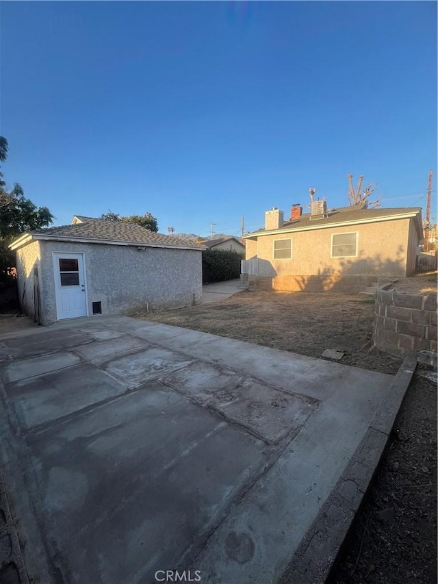 exterior space with a patio area