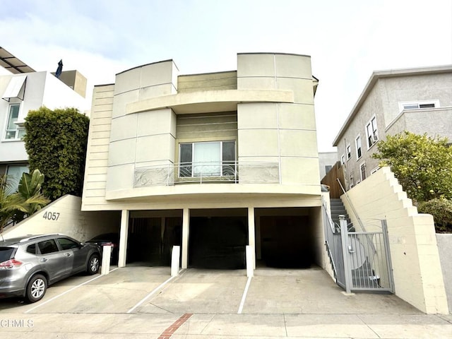 view of front of property with a balcony