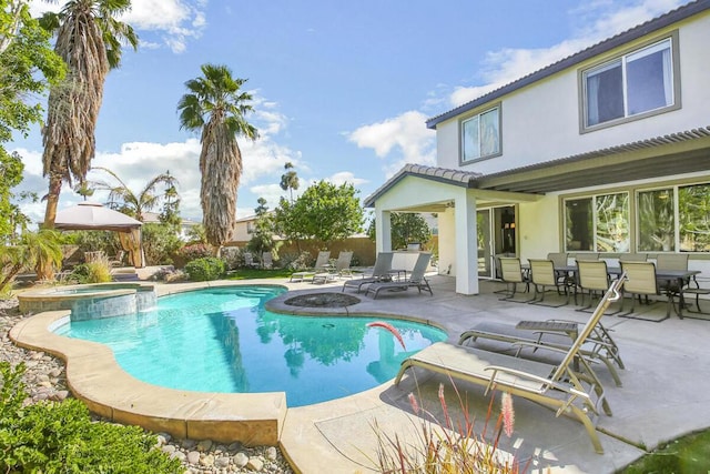 view of pool featuring a gazebo, an in ground hot tub, and a patio