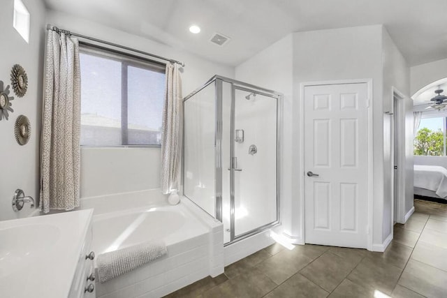 bathroom featuring ceiling fan, tile patterned floors, independent shower and bath, and vanity