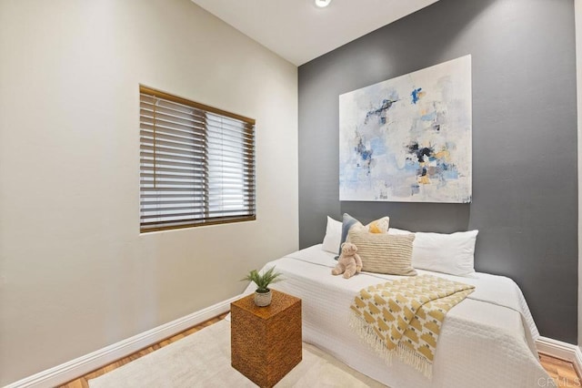 bedroom featuring hardwood / wood-style floors