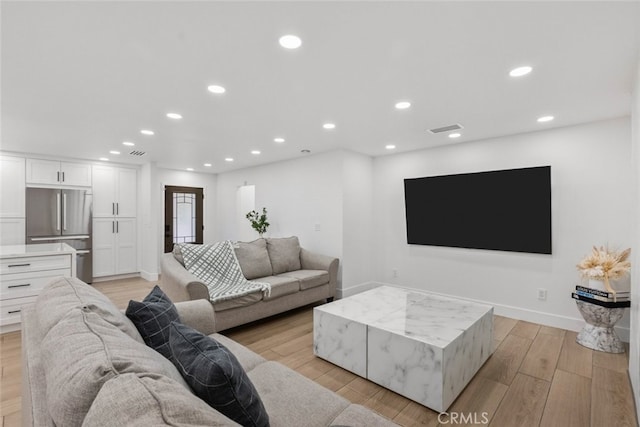 living room featuring light hardwood / wood-style floors