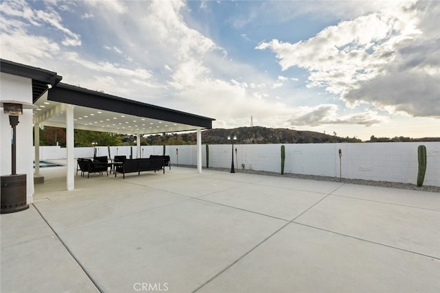 view of patio / terrace with a mountain view