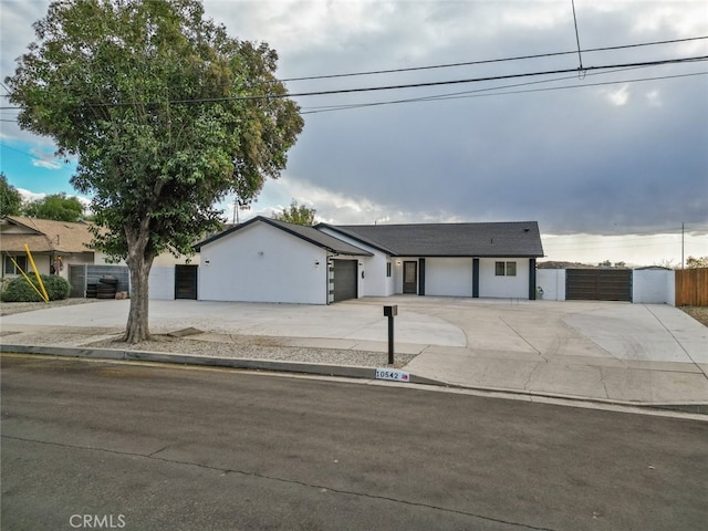 single story home with a garage