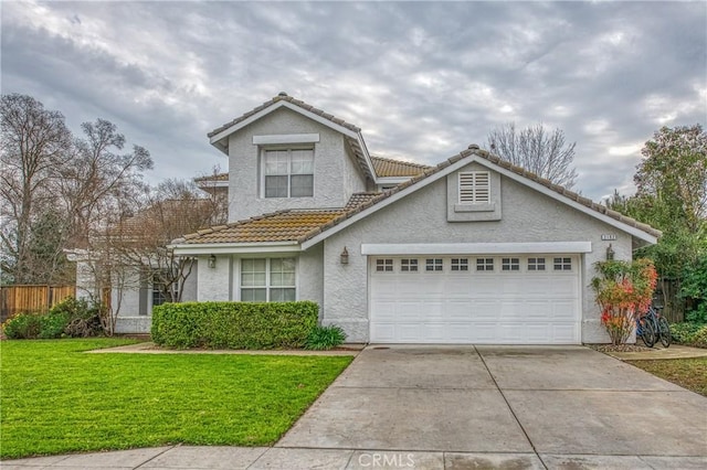 front of property with a garage and a front yard