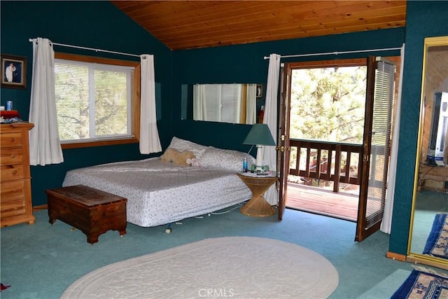 bedroom with access to outside, vaulted ceiling, carpet floors, and multiple windows