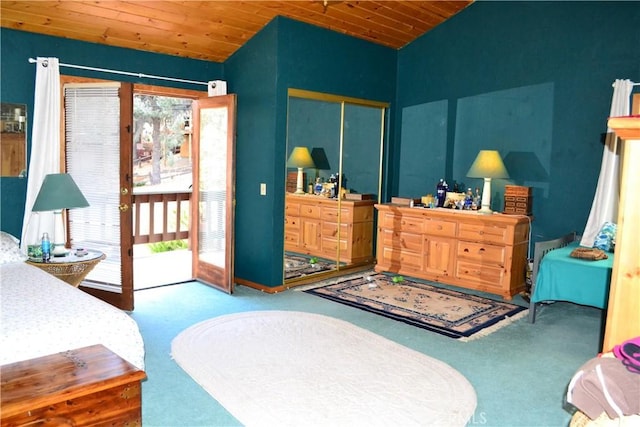 carpeted bedroom featuring a closet, access to outside, and wood ceiling