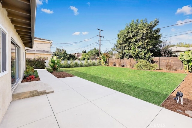 view of yard with a patio area