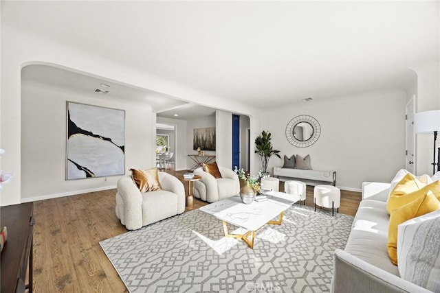 living room with hardwood / wood-style flooring