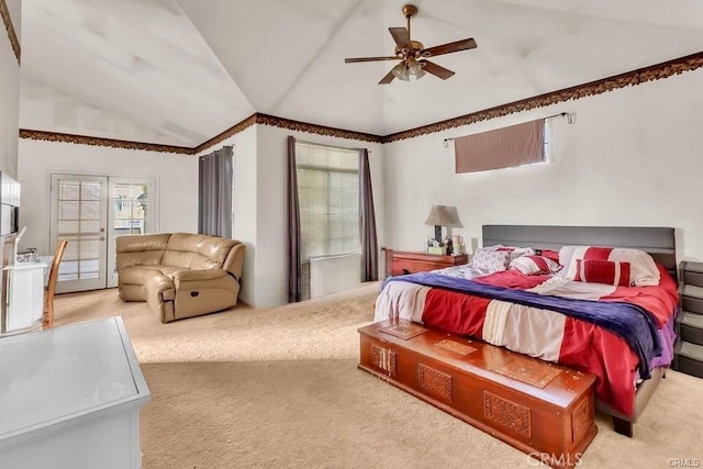 carpeted bedroom featuring ceiling fan and vaulted ceiling