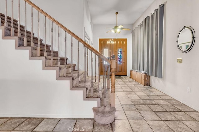 entryway featuring ceiling fan