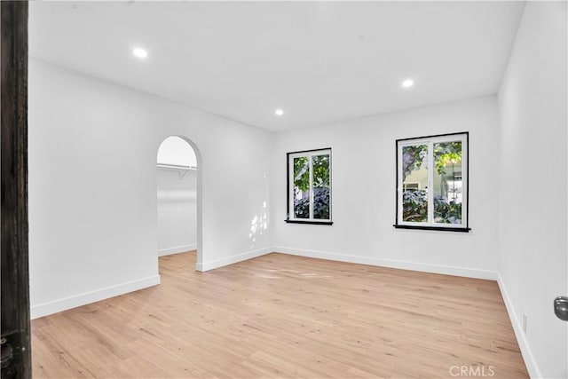 unfurnished room featuring light wood-type flooring