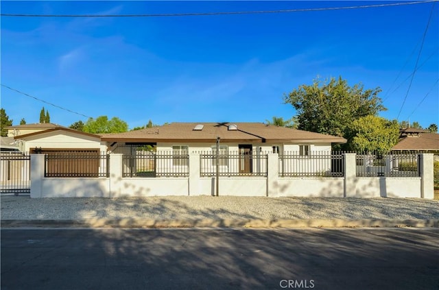 single story home with a garage