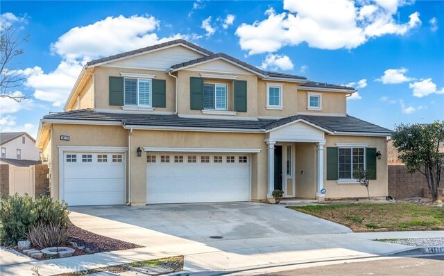 view of front of property with a garage