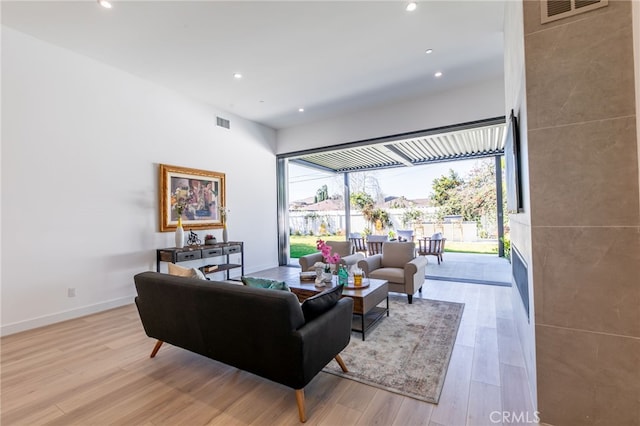 living room featuring light wood-type flooring