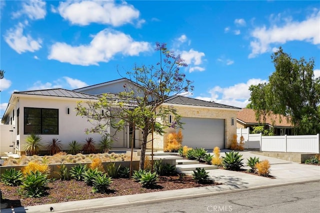 view of front of property featuring a garage