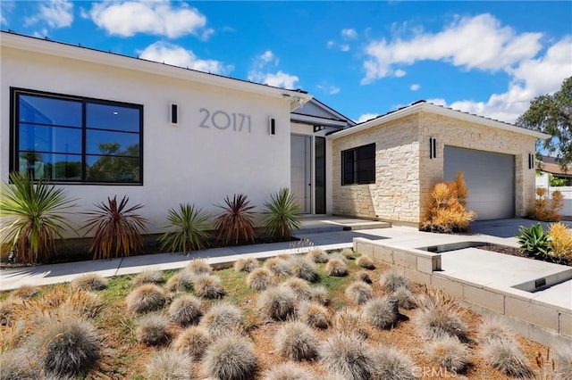 view of front of home featuring a garage