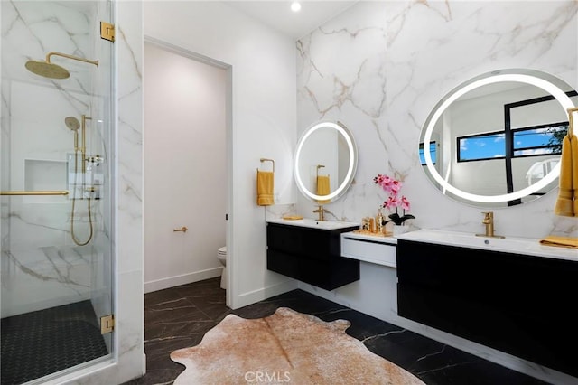 bathroom with an enclosed shower, vanity, and toilet