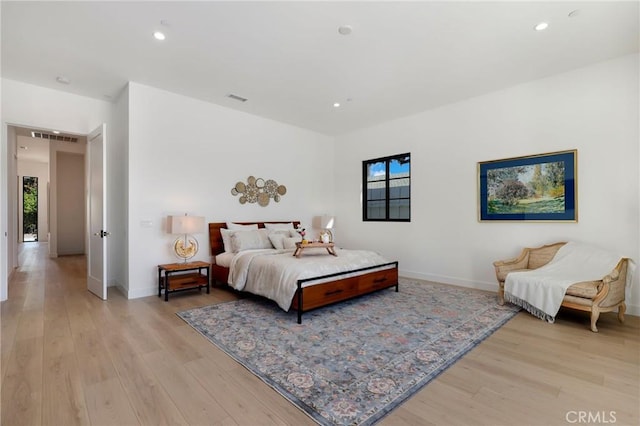 bedroom featuring light wood-type flooring