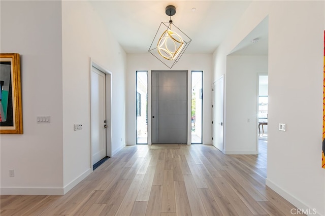 entrance foyer with light wood-type flooring