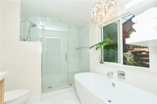 full bathroom featuring plus walk in shower, vanity, toilet, and tile patterned flooring