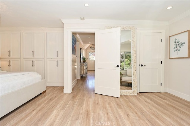 bedroom featuring light wood-type flooring