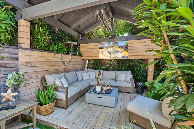 wooden deck featuring an outdoor living space